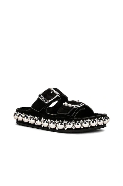 Alaïa Bombe Embellished Suede Slides In Noir