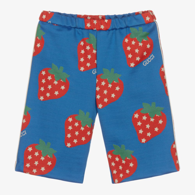 Shop Gucci Girls Blue Strawberry Baby Trousers