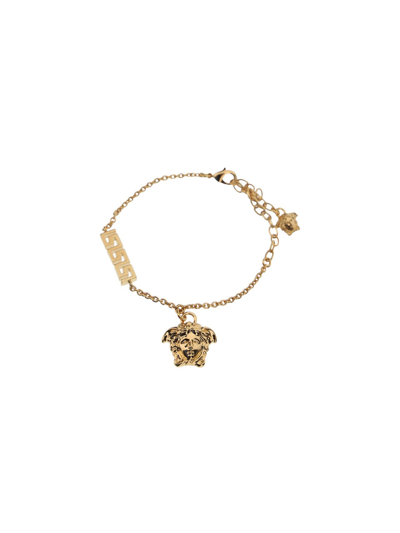 Shop Versace La Medusa Charm Bracelet In Gold
