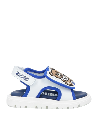 Shop Moschino Baby Sandals In White