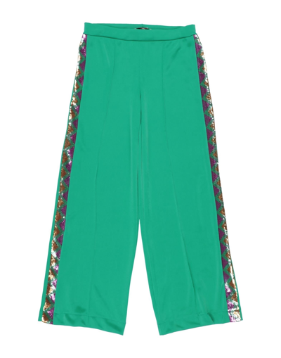 Shop Mariuccia Pants In Green