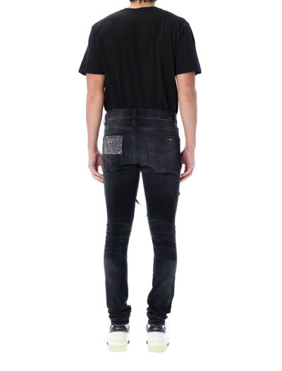 Shop Amiri Vintage Bandana Artpatch Jeans In Aged Black