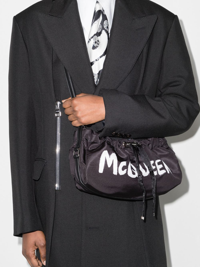 Shop Alexander Mcqueen Mini Bundle Drawstring Crossbody Bag In Black