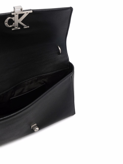 Shop Calvin Klein Logo-plaque Crossbody Bag In Black
