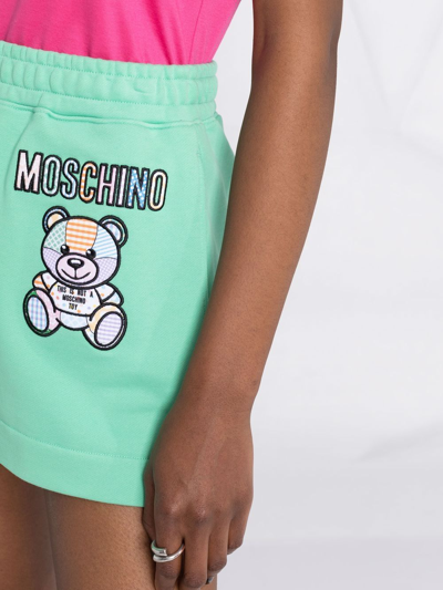 Shop Moschino Teddy Bear Motif Shorts In Green