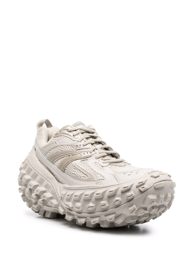 Shop Balenciaga Defender Chunky-sole Sneakers In Neutrals