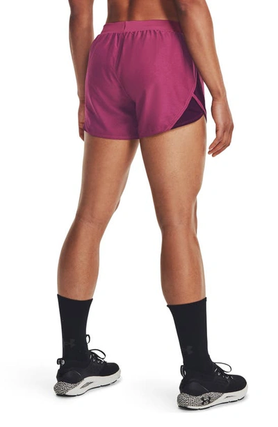 Shop Under Armour Fly By 2.0 Woven Running Shorts In Pink Quartz / Polaris Purple