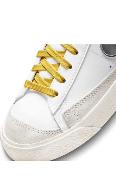 Shop Nike Kids' Blazer Mid '77 Vintage Sneaker In White/ Metallic Silver/ Sulfur
