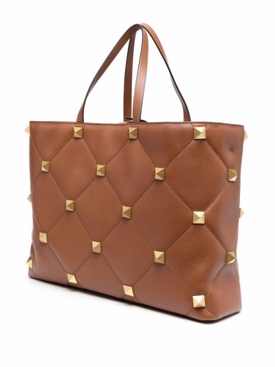 Shop Valentino Roman Stud Large Leather Tote Bag In Brown