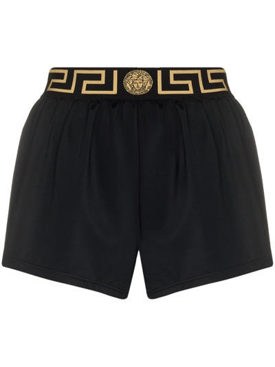Shop Versace Greca-waistband Shorts In Schwarz