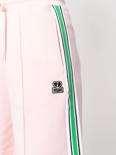 Shop Msgm Tape-detail Flared Track Shorts In Rosa