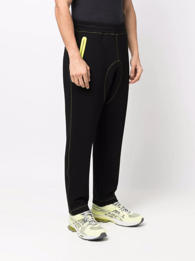 Shop Moschino Logo-print Track Pants In Schwarz