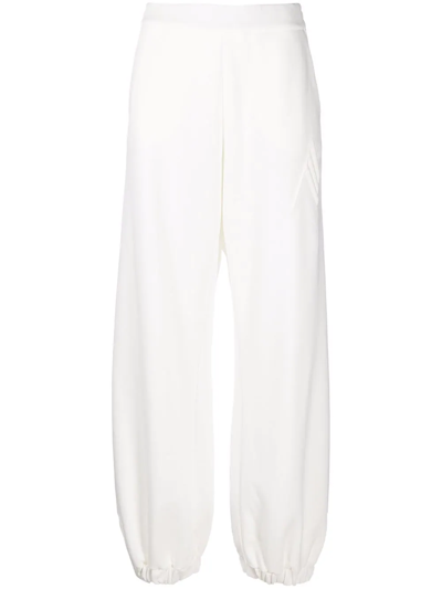 Shop Attico Tapered Wide-leg Track Pants In Weiss