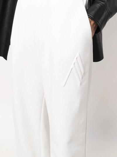 Shop Attico Tapered Wide-leg Track Pants In Weiss