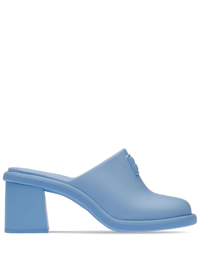 Shop Miu Miu Logo Embossed Mules In Blau