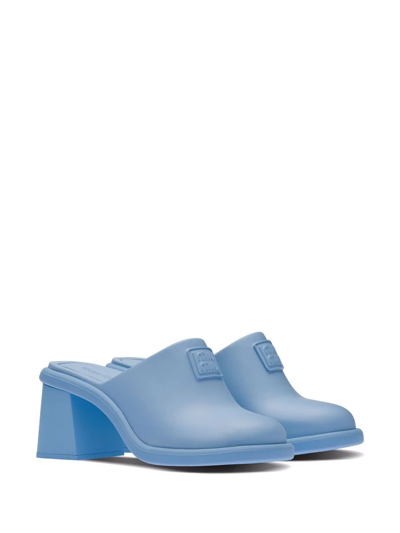 Shop Miu Miu Logo Embossed Mules In Blau