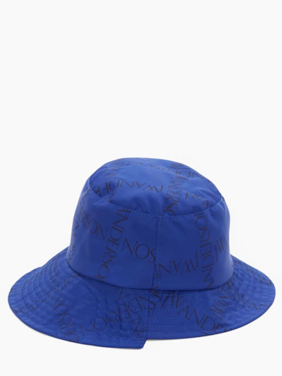 Shop Jw Anderson Asymmetric Logo-print Bucket Hat In Blue