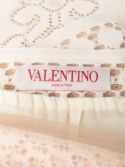Shop Valentino Lace Trousers In White
