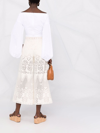 Shop Valentino Lace Trousers In White