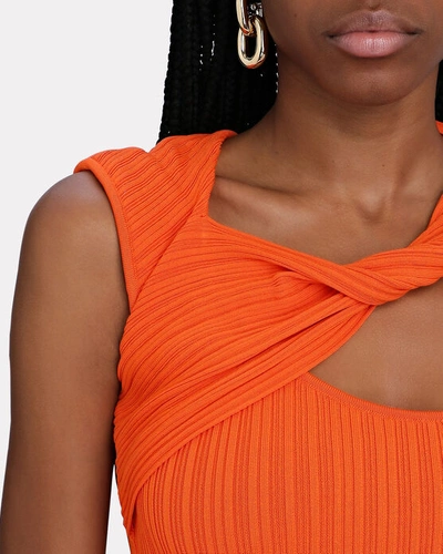 Shop Aknvas Alba Twisted Cut-out Rib Knit Top In Orange