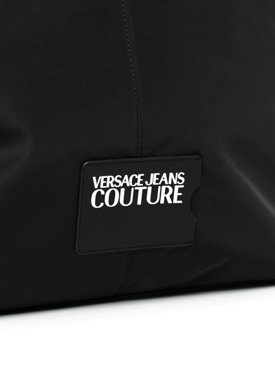 Shop Versace Jeans Couture Embossed-logo Tote Bag In Black