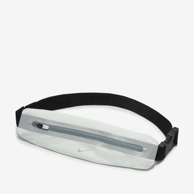 Shop Nike Slim Running Fanny Pack In Barely Green,black,silver