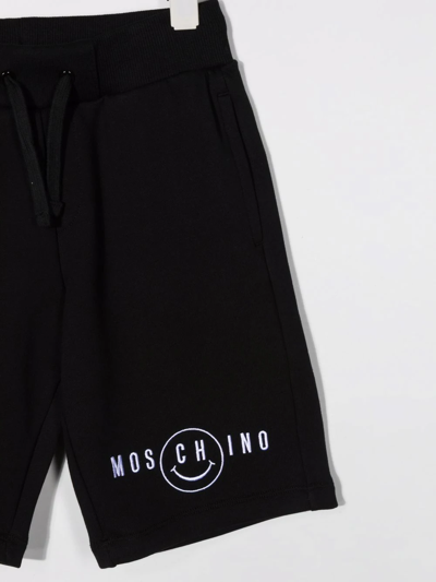 Shop Moschino Embroidered-logo Shorts In Black