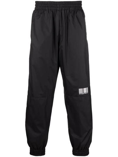 Shop Vtmnts Barcode-print Track Pants In Black