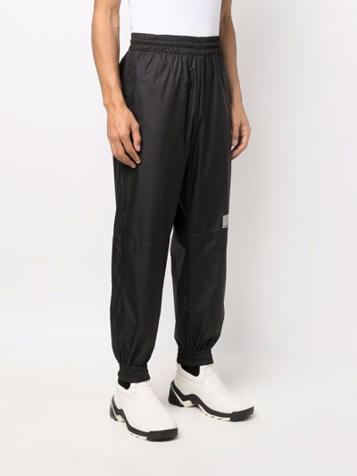 Shop Vtmnts Barcode-print Track Pants In Black