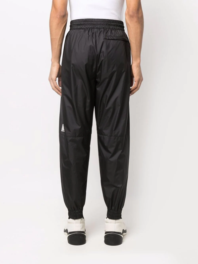 Shop Vtmnts Barcode-print Track Pants In Black