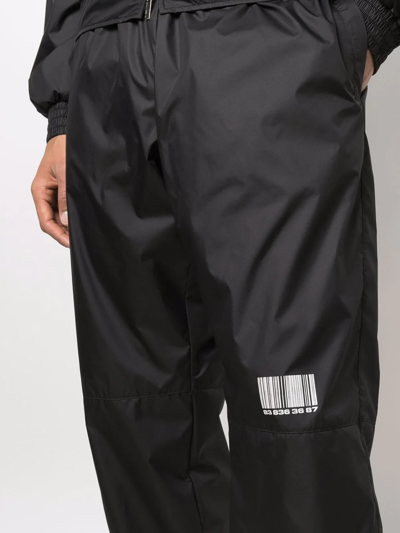 Shop Vtmnts Barcode-print Track Pants In Black