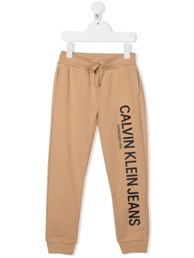 Shop Calvin Klein Logo Tracksuit Bottoms In Neutrals
