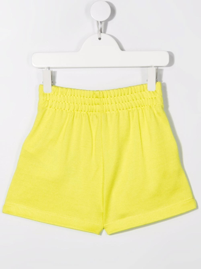 Shop Moschino Logo-print Elasticated Shorts In Yellow
