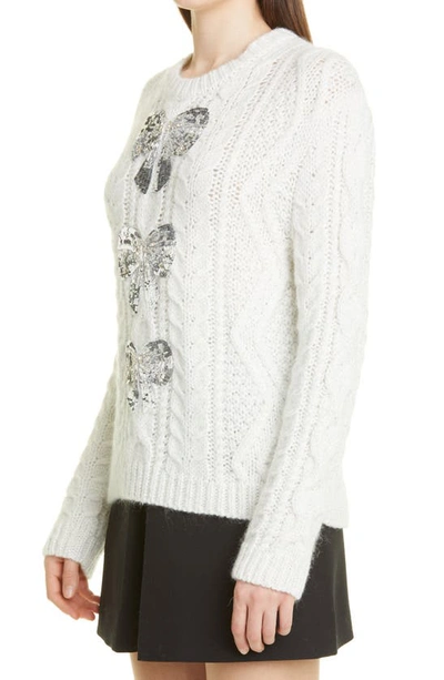 Shop Valentino Sequin Bow Cable Knit Sweater In Bianco Silver Cz7