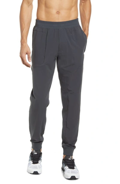 Shop Alo Yoga Co-op Pocket Tapered Joggers In Anthracite
