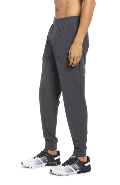 Shop Alo Yoga Co-op Pocket Tapered Joggers In Anthracite