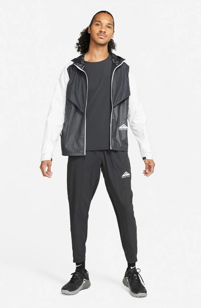 Shop Nike Windrunner Packable Jacket In Black/ Dk Smoke Grey/ White