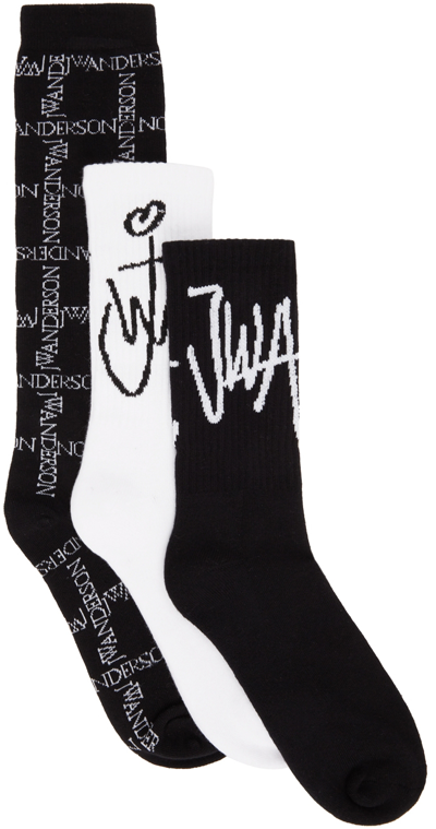 Shop Jw Anderson Three-pack Black & White Logo Socks In 901 Black/white