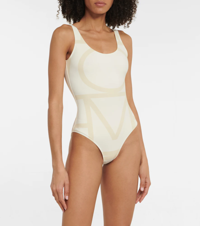 Totême Logo-print Scoop-neck Swimsuit In Sand Monogram
