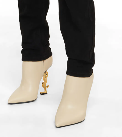 Shop Saint Laurent Opyum 110 Leather Ankle Boots In Real Beige