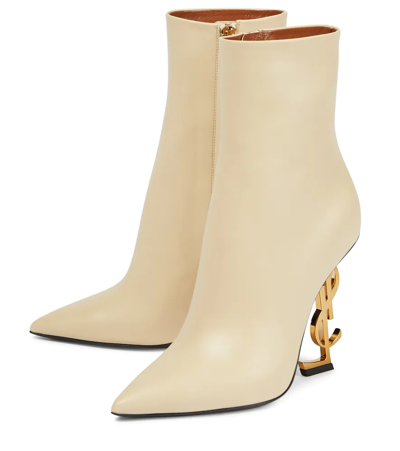 Shop Saint Laurent Opyum 110 Leather Ankle Boots In Real Beige