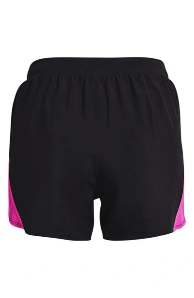Shop Under Armour Fly By 2.0 Woven Running Shorts In Black / Meteor Pink