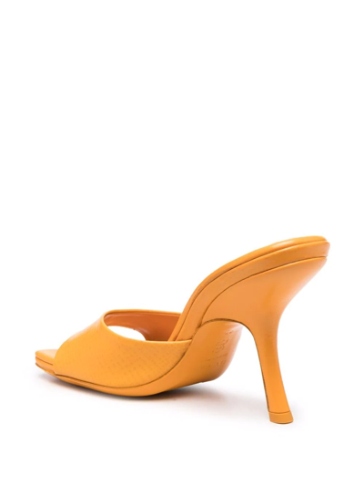 Shop By Far Mora Leather Mules In Orange