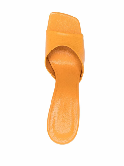 Shop By Far Mora Leather Mules In Orange