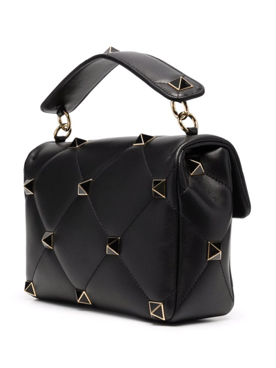 Shop Valentino Roman Stud Shoulder Bag In Black
