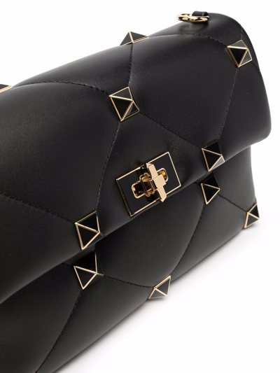 Shop Valentino Roman Stud Shoulder Bag In Black