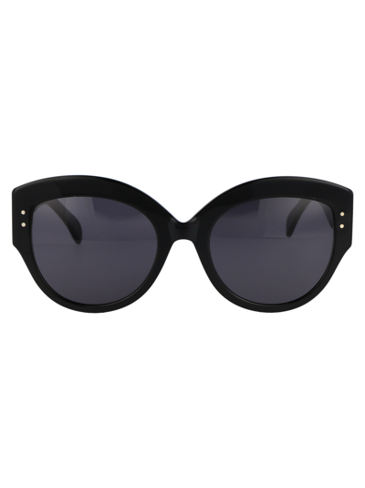 Shop Alaïa Aa0040s Sunglasses In 001 Black Black Grey