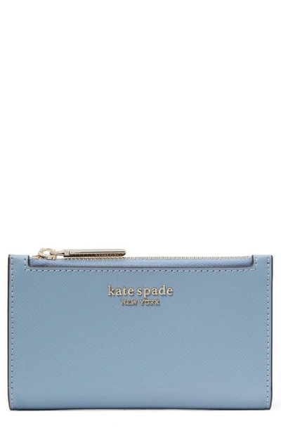 Shop Kate Spade Small Spencer Slim Leather Bifold Wallet In Morning Sky