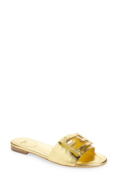 Shop Fendi Baguette Metallic Slide Sandal In Gold