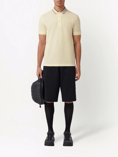 Burberry mans polo , Lemon , Faint black marks. As